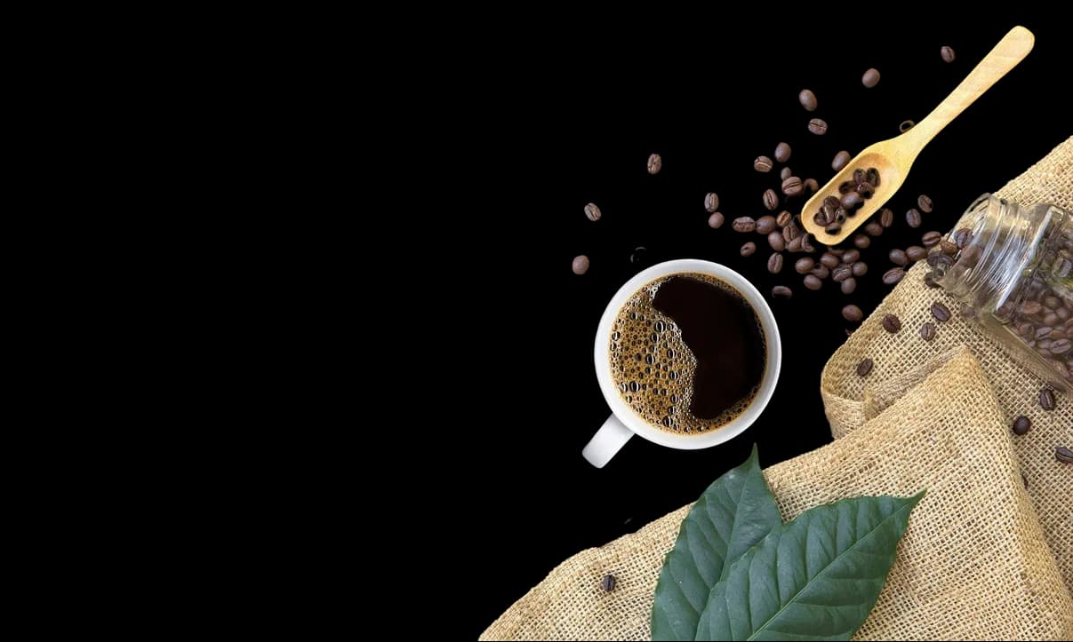 Coffee beans and wooden table